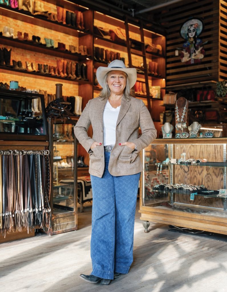 A woman wearing a cowboy hat