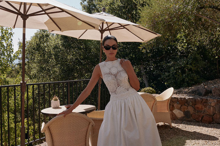 Annabelle Fleur stands in the shade of an umbrella at Auberge du Soleil